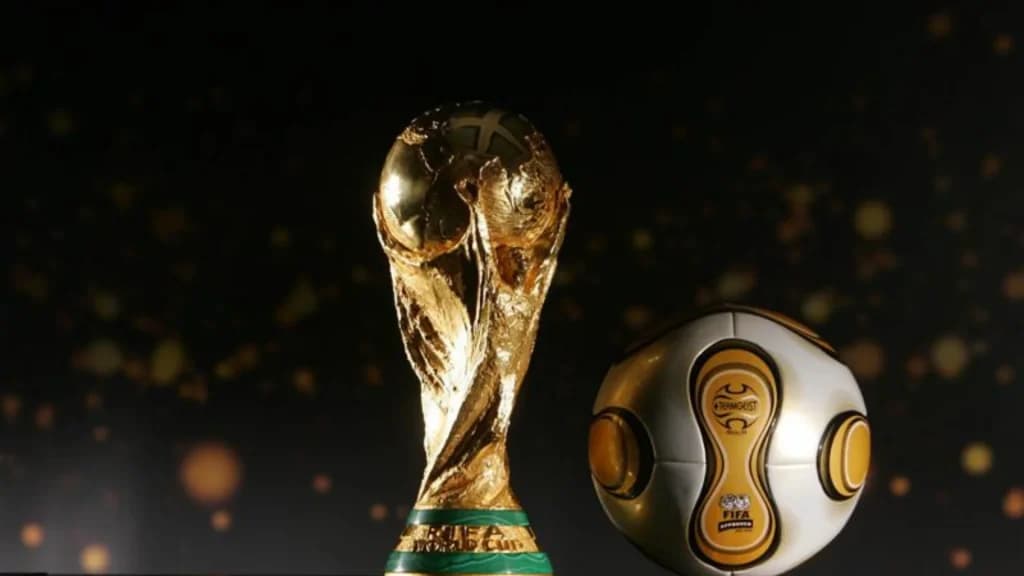 World Cup world cup trophy and ball side by side